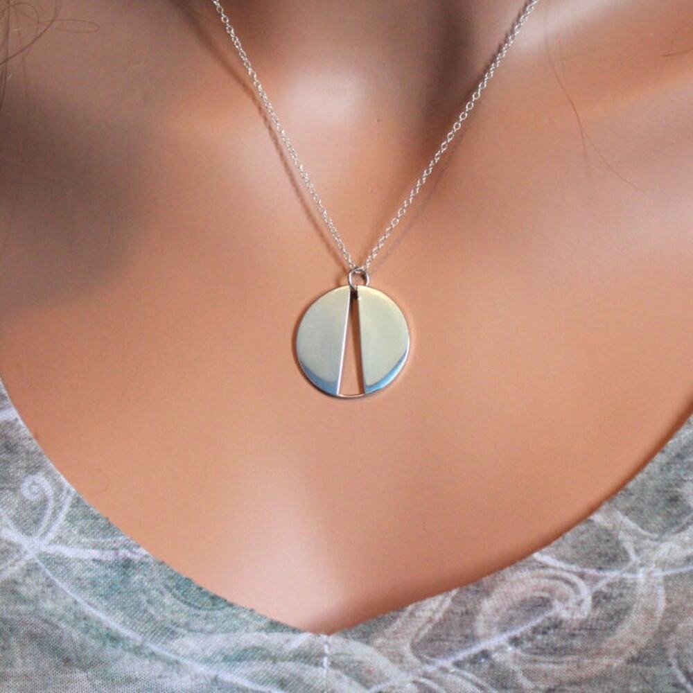 Sterling Silver Circle Pendant Necklace with Long Triangle Cutout